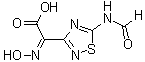 (Z)-5-(Formylamino)-alpha-(hydroxyimino)-1,2,4-thiadiazole-3-acetic acid molecular structure (CAS 76029-09-9)